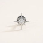 Natural silver titanium Ashley piercing celestial starburst stud with CZ, front view
