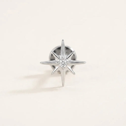 Natural silver titanium Ashley piercing celestial starburst stud with CZ, front view
