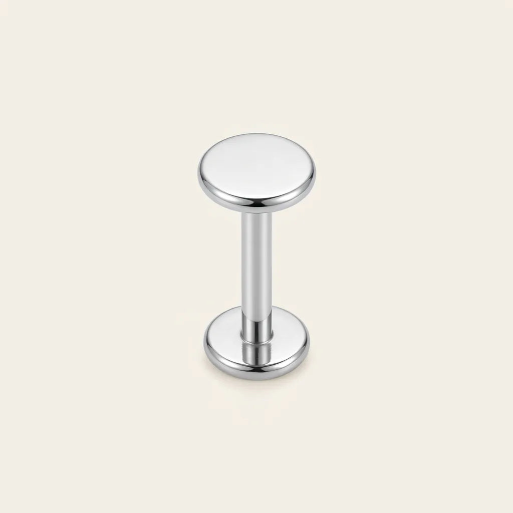 Natural silver titanium Ashley piercing flat disc stud, front view

