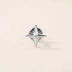 Natural silver titanium Ashley piercing four pointed star stud, front view
