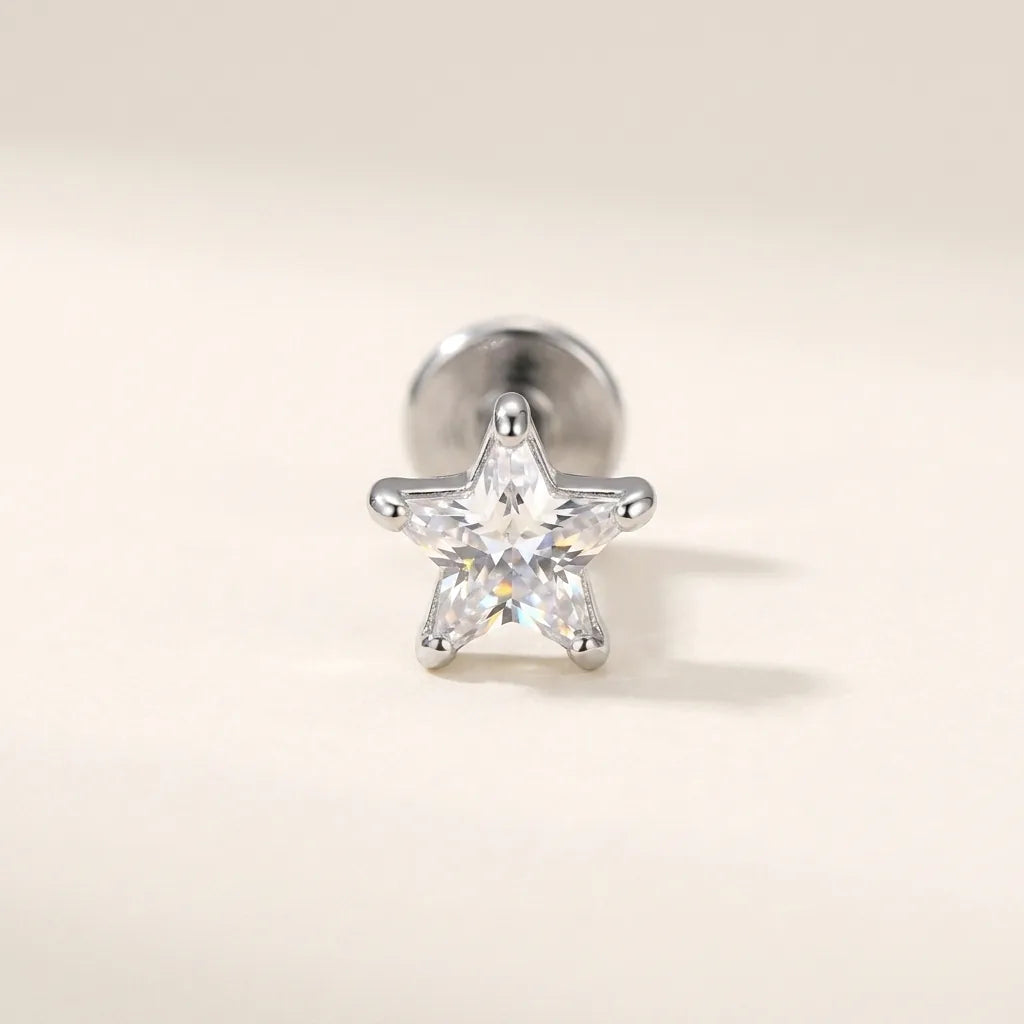 Natural silver titanium Ashley piercing star cut CZ stud, front view
