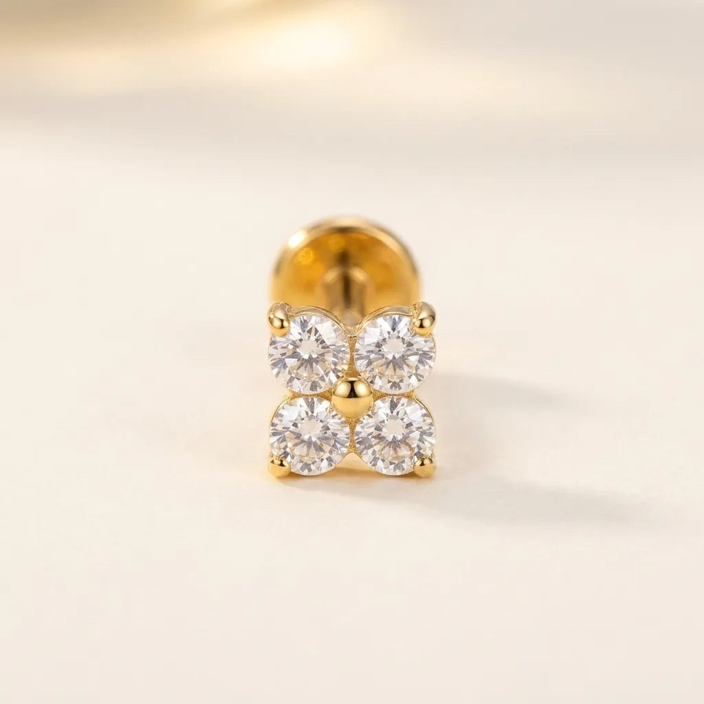 Gold titanium Ashley piercing four leaf clover CZ stud, front view
