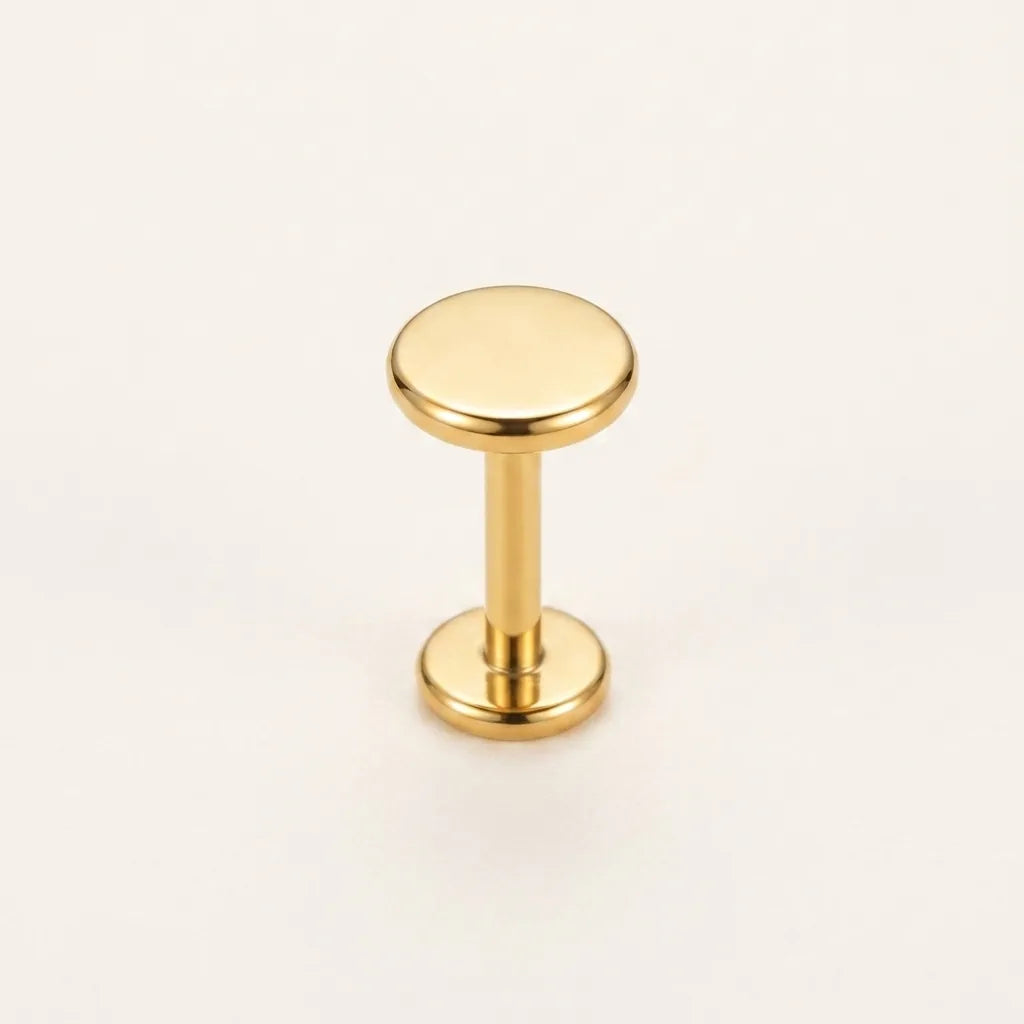 Gold titanium Ashley piercing flat disc stud, front view
