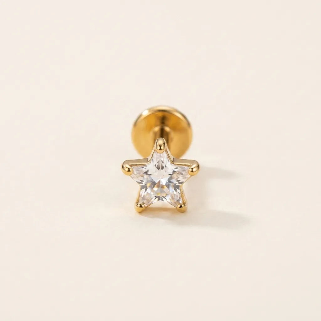 Gold titanium Ashley piercing star cut CZ stud, front view
