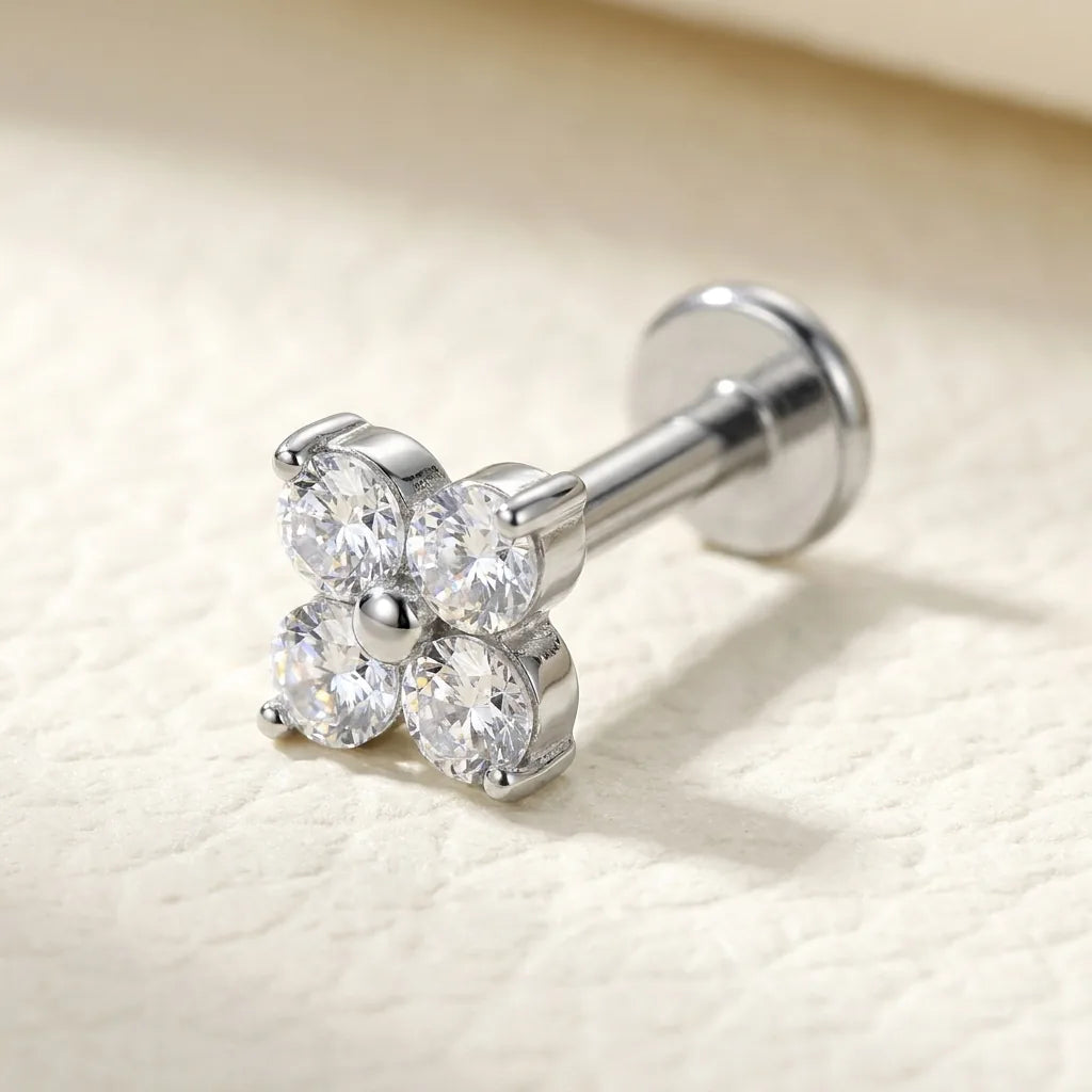 Natural silver titanium Ashley four leaf clover CZ labret, three quarter angle
