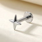 Natural silver titanium Ashley four pointed star labret, three quarter angle
