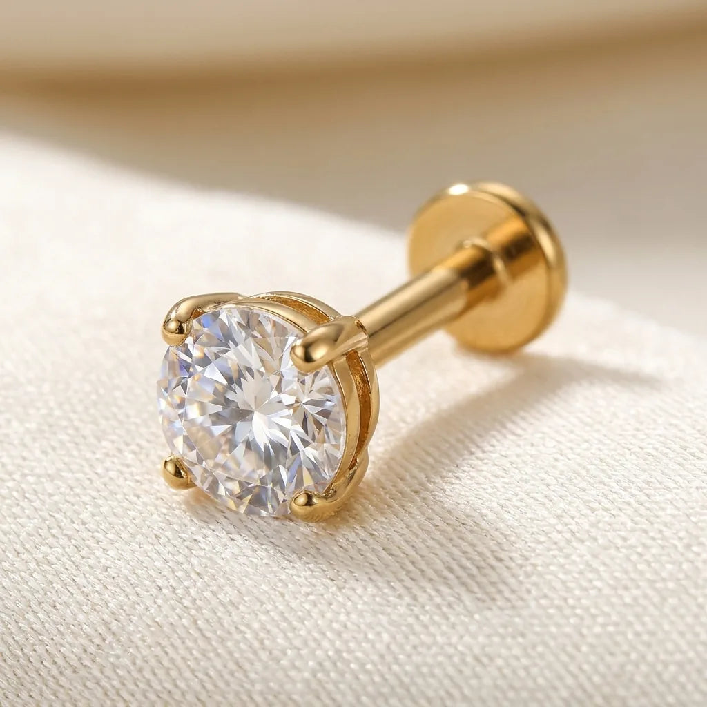 Gold titanium Ashley piercing round CZ solitaire stud, front view
