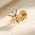 Gold titanium Ashley celestial starburst labret, three quarter angle
