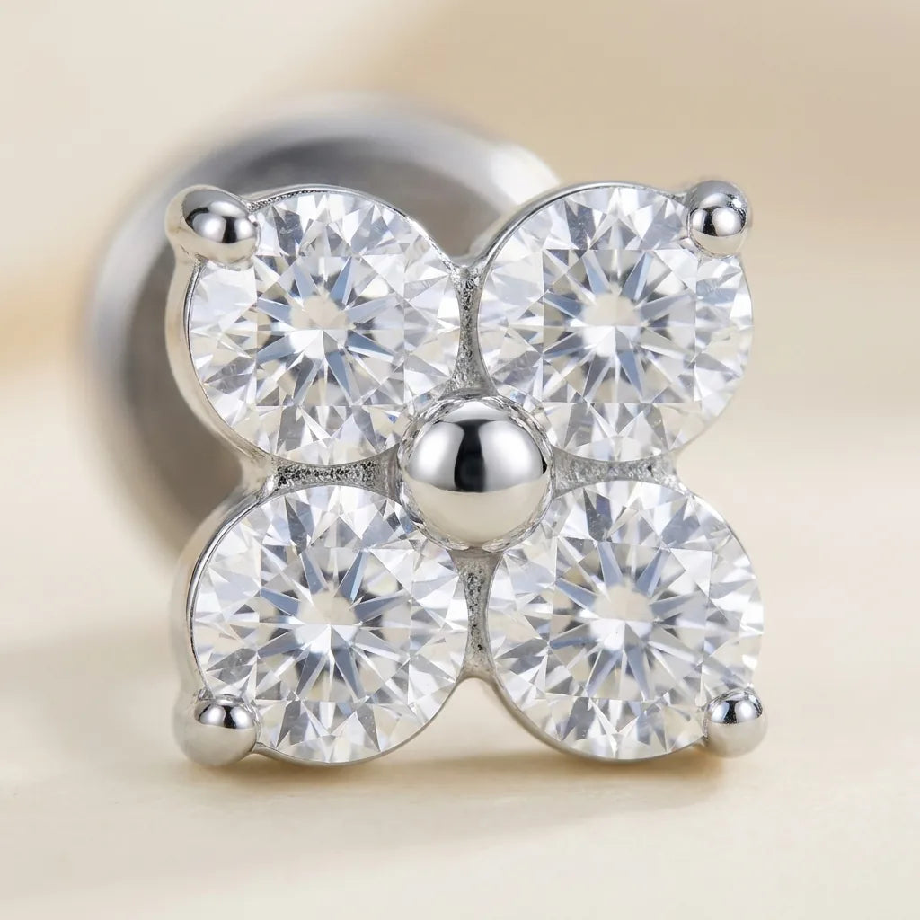 Macro close up of a titanium Ashley four leaf clover CZ stud
