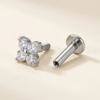 Internally threaded titanium Ashley clover labret with the top and post separated
