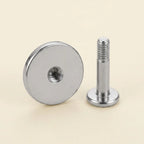 Internally threaded titanium Ashley disc labret with the top and post separated
