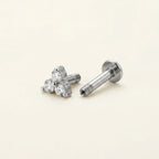 Internally threaded titanium Ashley trinity labret with the top and post separated
