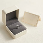 Ashley disc piercing gift packaging with a titanium stud and a certificate card
