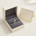 Ashley star cut piercing gift packaging with a titanium stud and a certificate card
